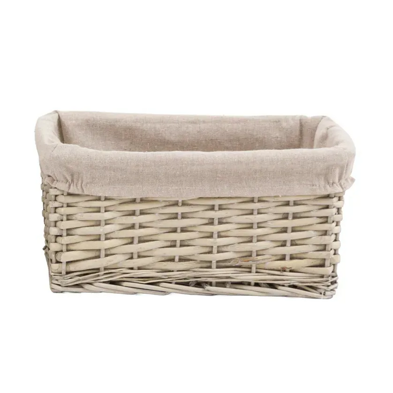 Three woven baskets with beige interior on a white background